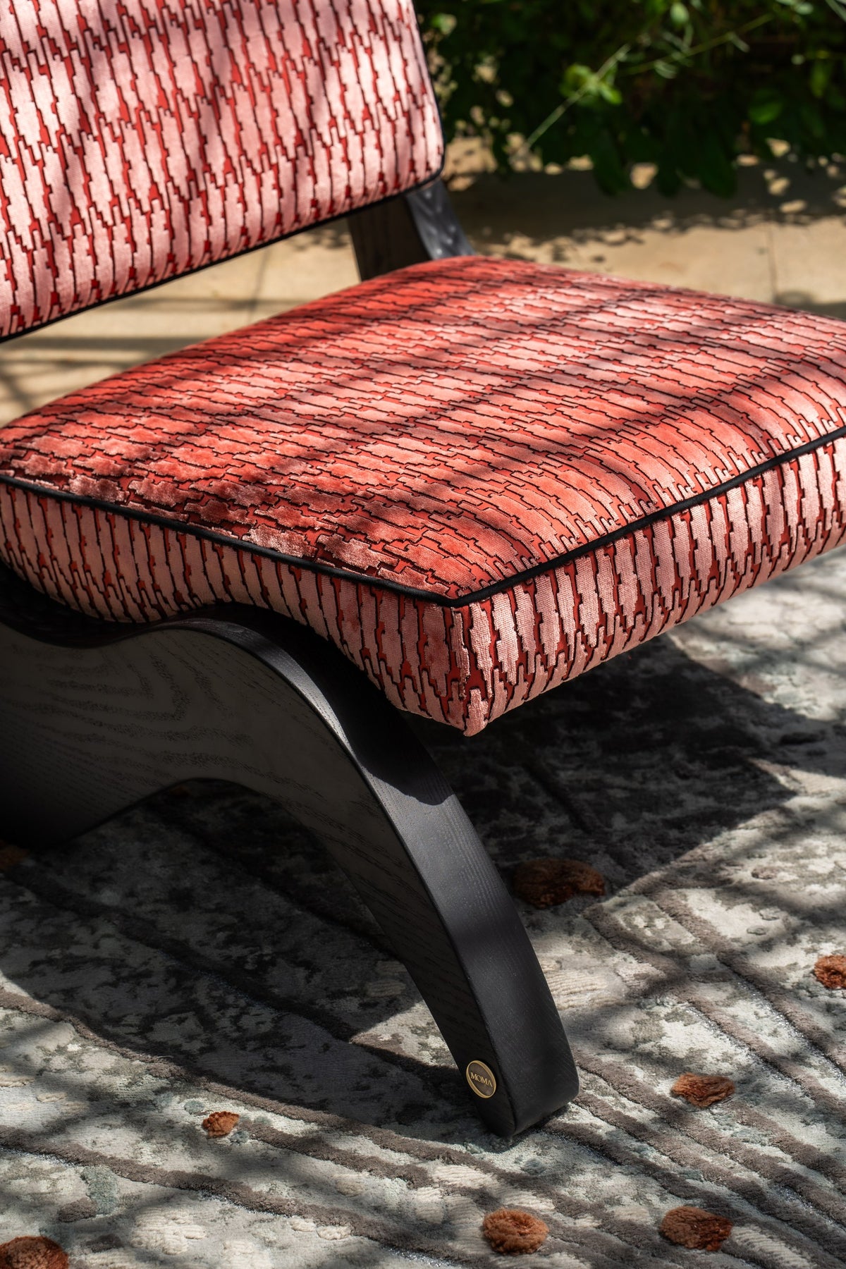 Arae Red armchair seat and base detail