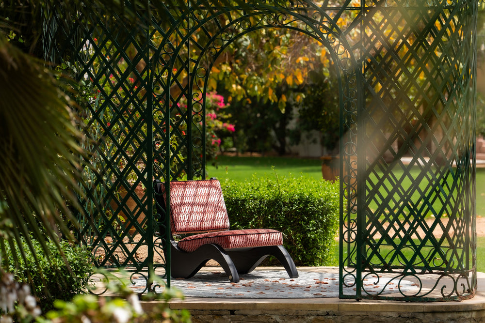 Arae armchair on The Starburst rug in Lunar Chrome