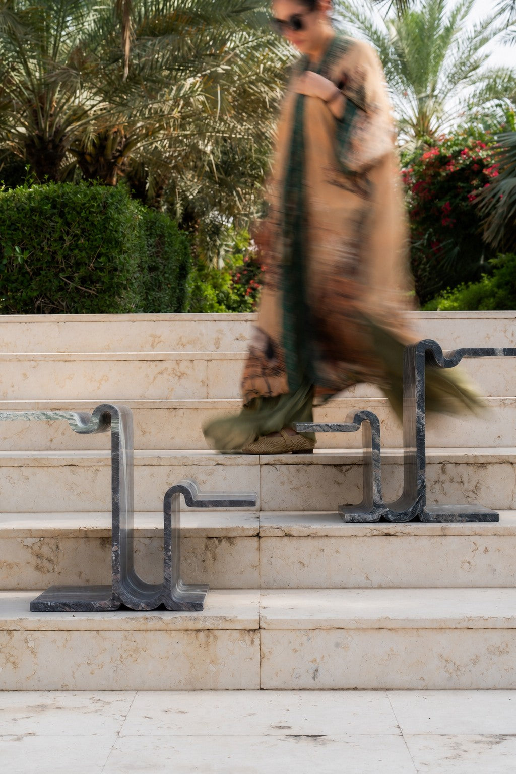 Lynx accent tables on garden steps