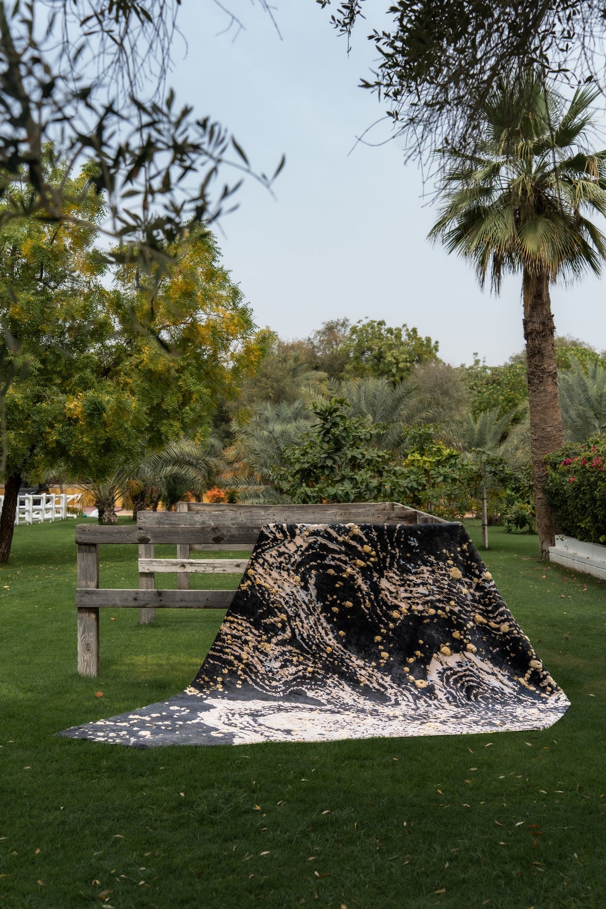 The Milky Way rug in Comet Black, styled outdoors